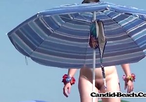 Wet body babe showing off on a nudist beach