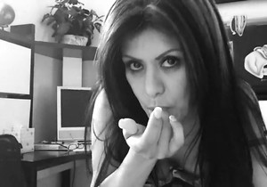 Office hottie masturbates with legs spread wide