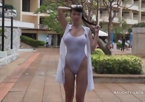 Sensual angel with hard nipples shows her body on the beach