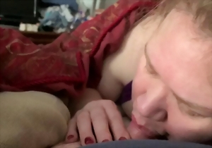 Aesthetic chick is sucking a large dick with pleasure
